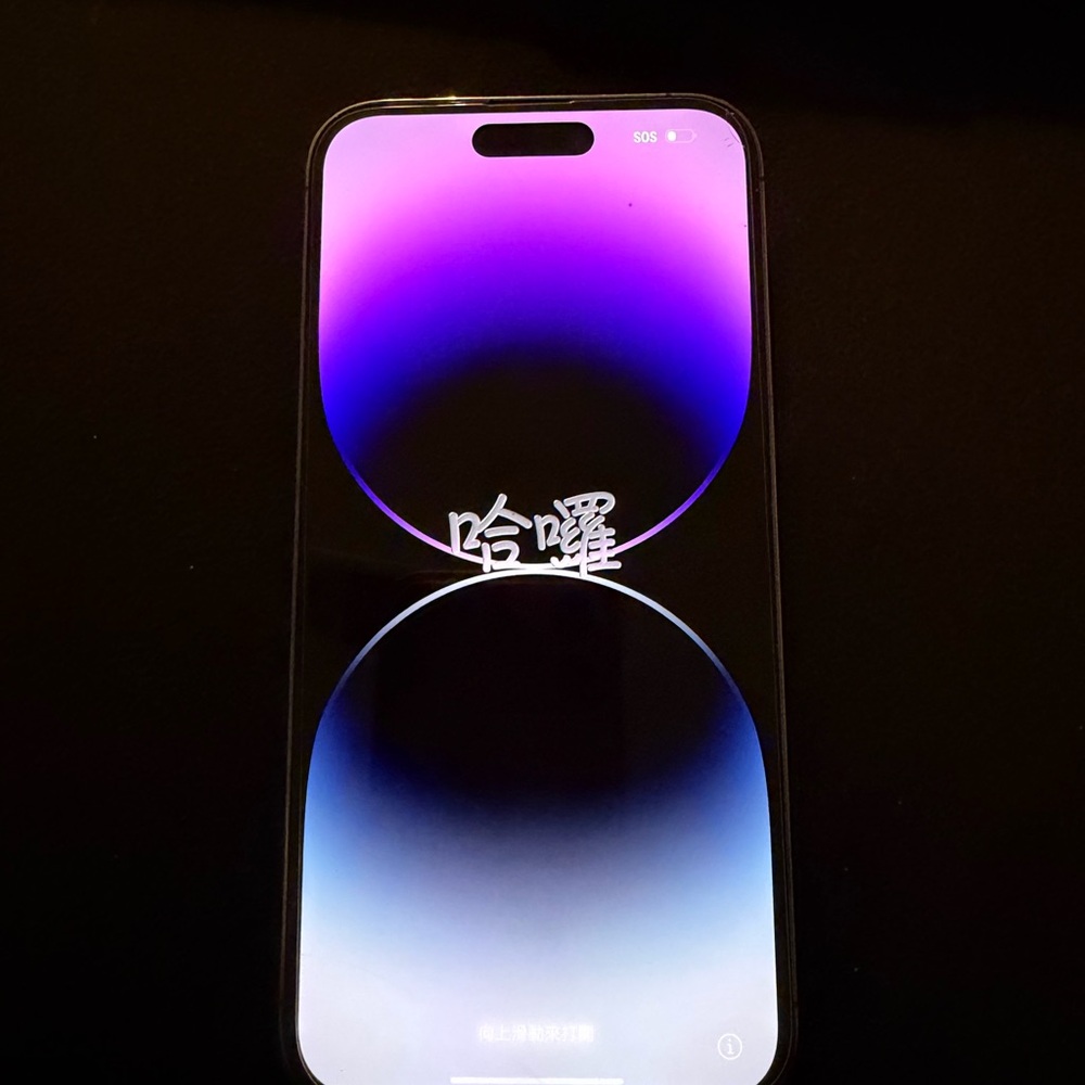 Apple Smartphone with Purple and Black Display
